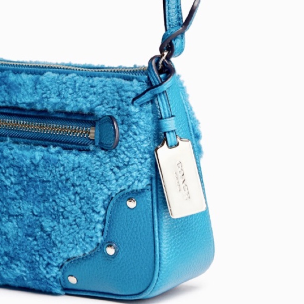 [SOLD] COACH Rhyder Pochette in Peacock Blue Shearling